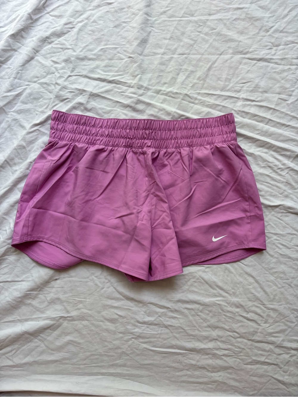 Nike Women's Lilac Athletic Running Shorts with White Swoosh